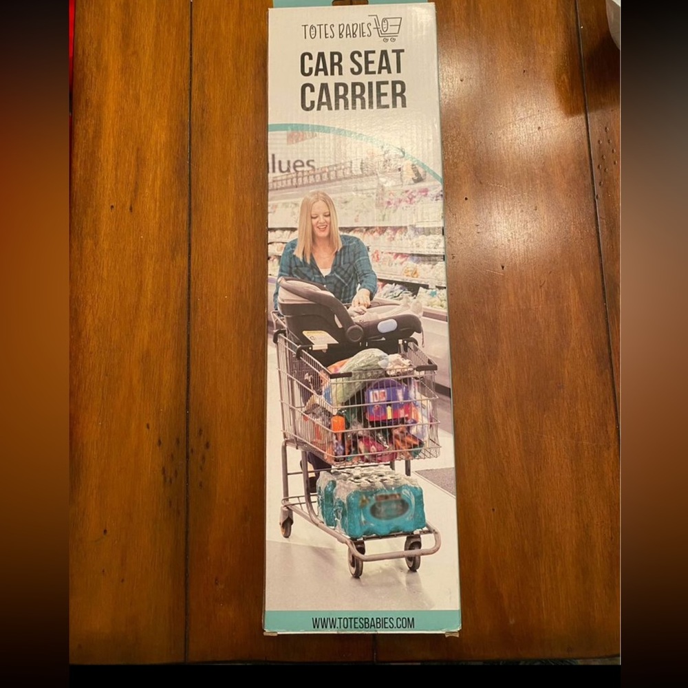 NIB totes baby car seat carrier